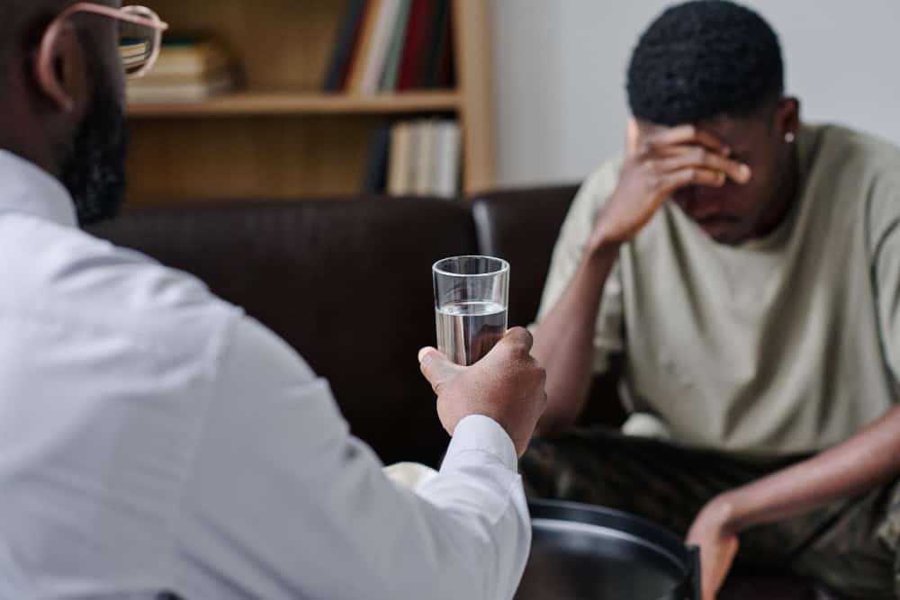 Psychotherapist supporting a patient during stimulant rehab in Itasca, IL at Fox Valley Behavioral Health.