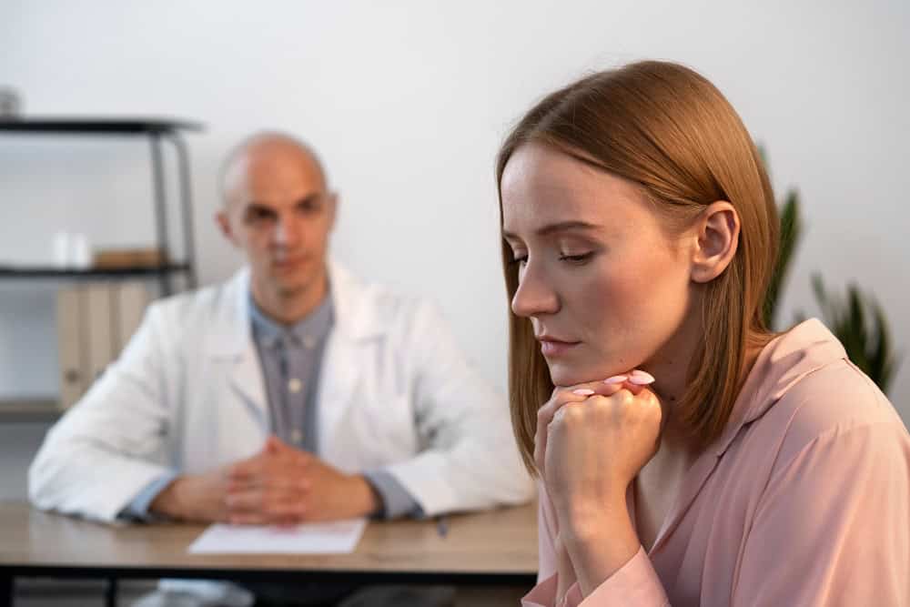 Woman participating in a therapy session during mental health treatment in Arlington Heights, IL.